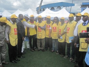 Governor Emmanuel Uduaghan (center) in a group photograph with members of Rotary Club, during the flag-off the 2013 third quarter polio eradication sensitization campaign held at the Warri City Stadium.