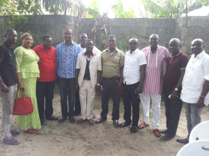 Delta HOSTCOM executive and Delta central members in a group photograph.