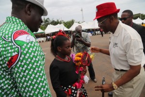 Delta State Governor, Senator Ifeanyi Okowa (right); Comrade Mike Okeme (left) and Miss Joan Jeremi, during the Governor's arrival to the 2016 (May Day) Labour Day Celebration, at Cenotaph, Asaba.
