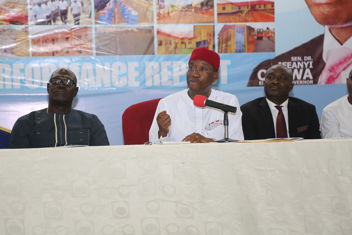 Delta State Governor, Senator Ifeanyi  Okowa (middle), flanked by the Commissioner for Information, Mr Patrick Ukah (left) and the Chairman, State PDP, Barr. Kingsley Esiso during the Governor’s First Year Performance  Report to the Press in Asaba.
