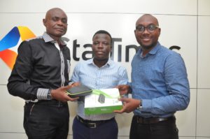 L-R: John Oseimeme, Sales Director, Israel Bolaji, Head of Public Relations and Dare Kafar, Marketing Director, all of StarTimes Nigeria unveiling the New StarTimes 2-in-1 Combo Decoder in Lagos.