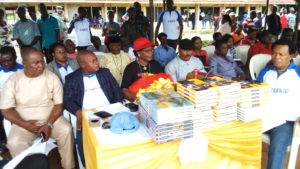 Surveyor Peter Akarogbe (2nd left) Dr Mrs Veronica Ogbuagu (middle) and others during  the donation of free text books to Schools in Oyede community yesterday.  