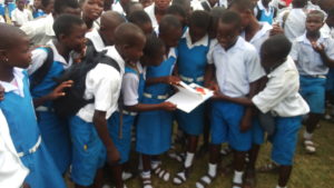 Some of these pupils admiring one of the books. 