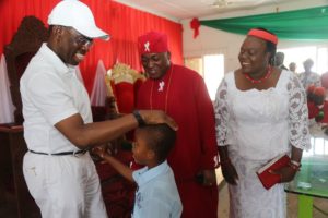 Delta State Governor, Senator Ifeanyi Okowa (left); His Royal Majesty, Barr. Anthony Ovietobore Ogbogbo I (middle); his wife and Son, during the Governor's Visit to his Palace