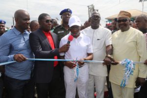 Delta State Governor, Senator Ifeanyi Okowa (middle); State PDP Chairman, Barr. Kingsley Esiso (2nd right); Majority Leader, Hon. Tim Owhefere (right); Commissioner for Works, Chief James Augoye (2nd left) and Chairman, Isoko North Local Government Area, Emmanuel Egbabor, during the Commissioning of Old Ozoro/Oleh Road.