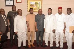 House Committee Chairman and members in a group photograph with Hon. Commissioner for Works 