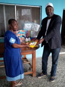 Mrs Adu Cecilia, the Patron received the gift items on behalf of the Heart of Delta Orphanage home